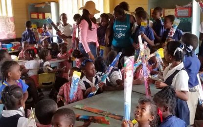 Police travels over 75 miles up-river, brings cheers to Bara Cara childrenSports gear and kites presented to kids