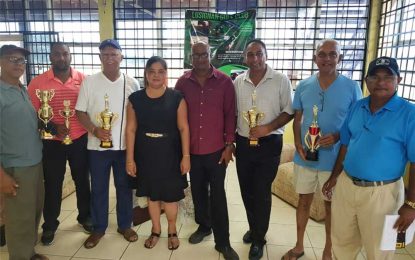 Veteran Reis is champion in Global Auto Spares inaugural Golf Tourney LGC shares kites to kids in Albouystown