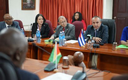 Wary Guyana holds talks with Cuba on migration, TIP