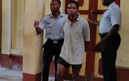 Man accused of killing Albouystown footballer weeps in courtroom