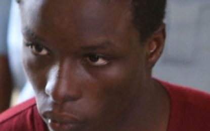 Murder accused jailed for 12 months for robbing fruit vendor
