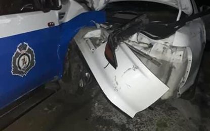 Grove police pickup crashes into two cars after “chase”