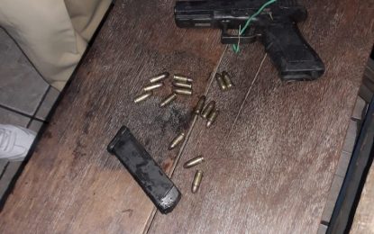 Exposed big toe gives away gun-toting man in hiding