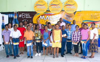 Banks DIH Limited presents bursaries to 23 children of employees, shareholders