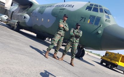 Two soldiers trained in parachute folding, maintenance