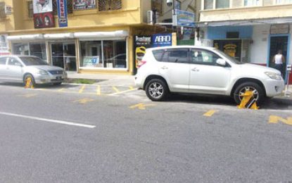 Cops put the clamp on parking violators