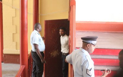 Taxi-driver remanded on gun charge