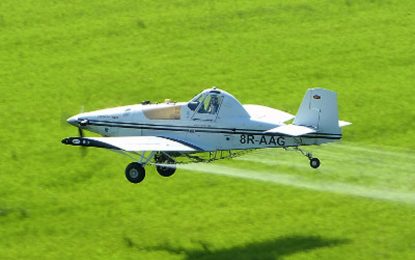 Pilot survives after crop-dusting plane flips while landing