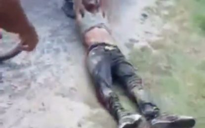 Man allegedly shot and injured by police after being found with gun
