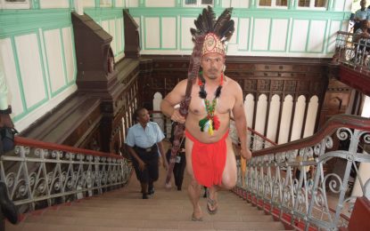 Shuman appears in court with traditional wear
