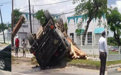 Overturned truck causes major traffic jam on East Bank corridor