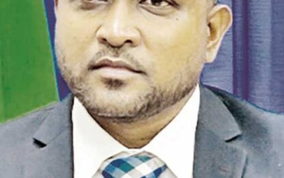 Minister Dharamlall halts process to hire company founded by son