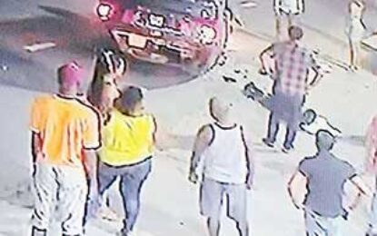 Speeding car hits man, upturning with passengers inside