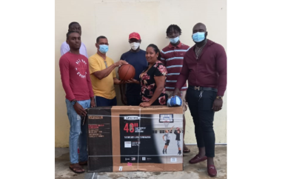 Businessman Clement Munroe donates basketball backboards, balls to RHT Jammers