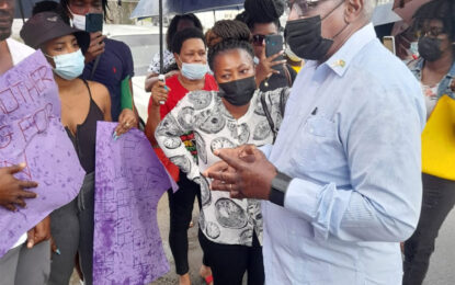 Family of man killed by police protest outside Ministry of Home Affairs