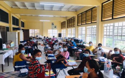 Adolescent mothers in Region One being trained in Cookery