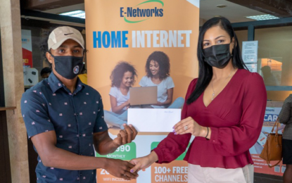“E-Networks make financial contribution to Olympic-bound boxer Allicock”