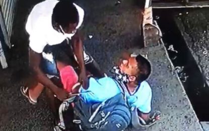 Knife bandit caught on camera robbing cop of haversack