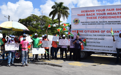 Cease oil production until Exxon agrees to contract changes – protestors demand