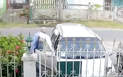 Locked car door saves pensioner from bandits