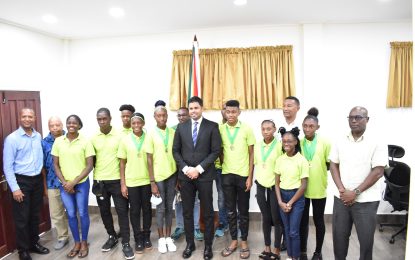 Minister Ramson welcomes CARIFTA team home