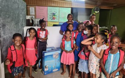 Digicel donates teaching aids to educator providing free lessons to Laing Avenue youngsters
