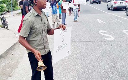 K/News publisher-led protest for better oil deal moves to McDoom