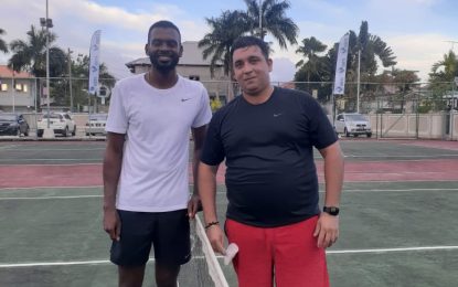 Defending champion Garcia keeps title defence alive