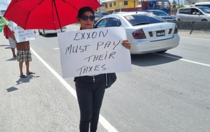 “No tax, no oil” – protestors demand Exxon pay their own taxes or leave Guyana’s oil