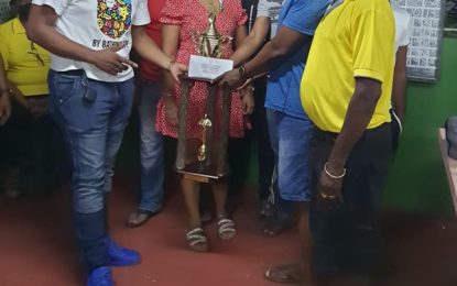 Executive capture Champion of Champions dominoes title