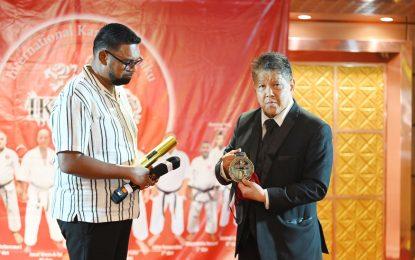 President Ali gets Honourary 8th Dan Black Belt