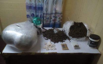 Cops arrested at roadblock with marijuana, cocaine and ammo