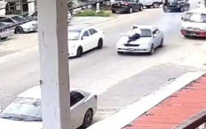 Man who drove with cop on car bonnet, slapped with multiple charges  