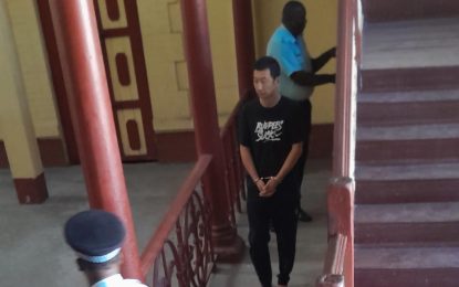 Chinese national on bail for forging extension of stay stamp