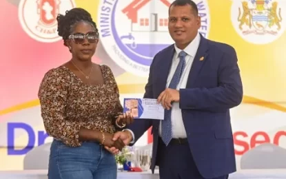 Close to 400 persons receive titles for lands