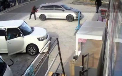 Bandit shot during robbery at Chinese supermarket