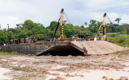 Sinking  Kwakwani barge being repaired by Govt.