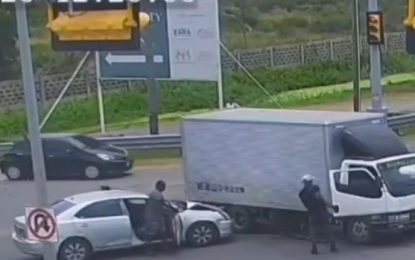 Driver jumps light, collides with canter then drives away