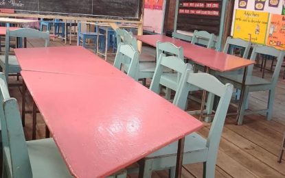 Low turnout at schools after fiery riots