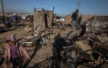 Israeli strikes flatten tented area for displaced Gazans