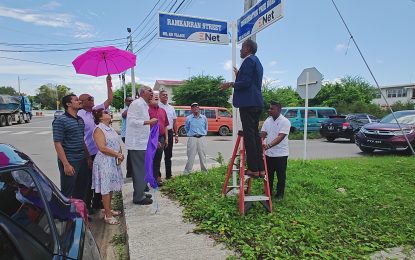 Mayor unveils street sign to honour Boysie Ramkarran