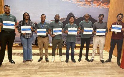 Eight MODEC Guyana trainees in Singapore for training