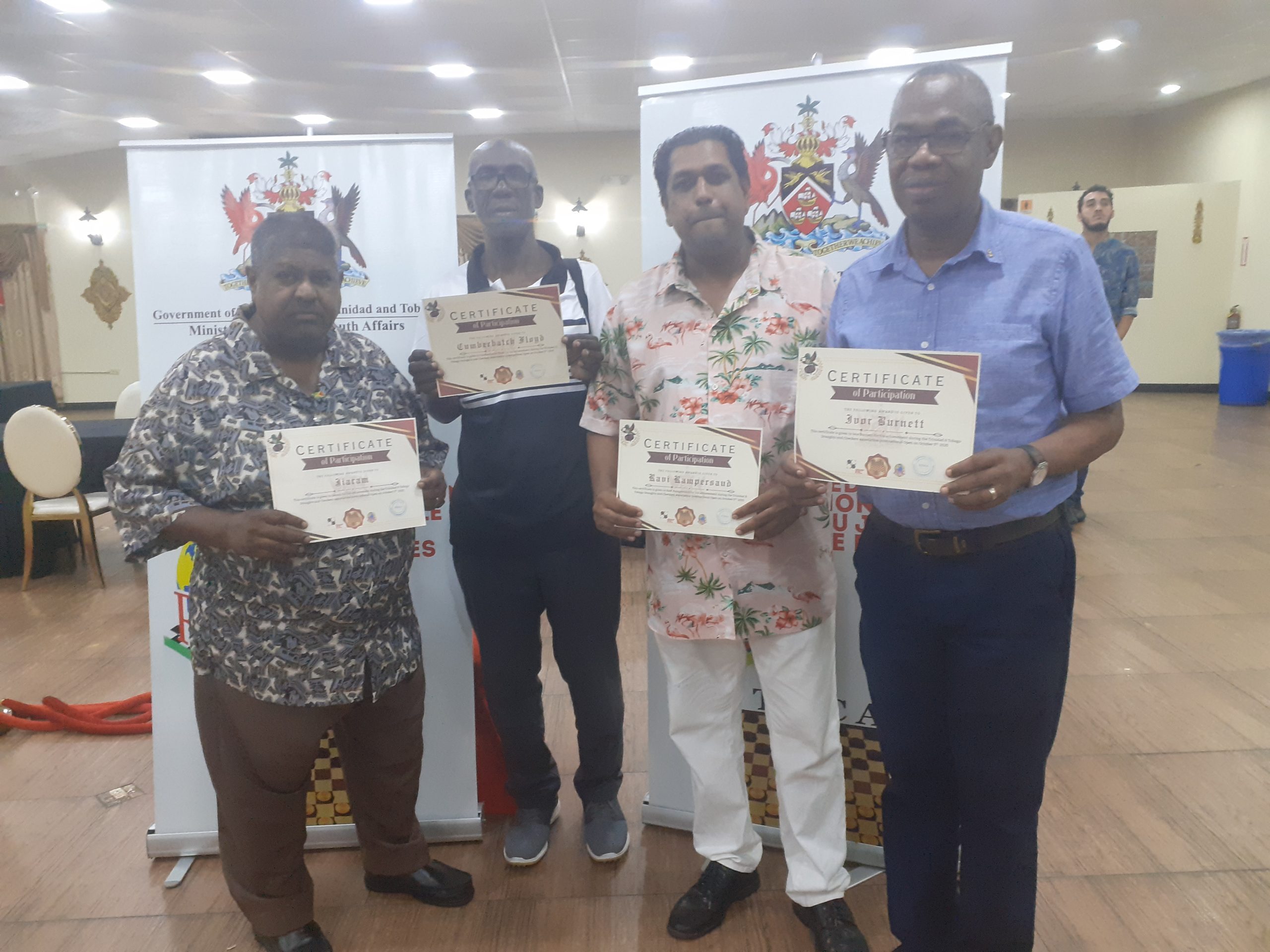 Local players return after International Draughts tourney in T&T