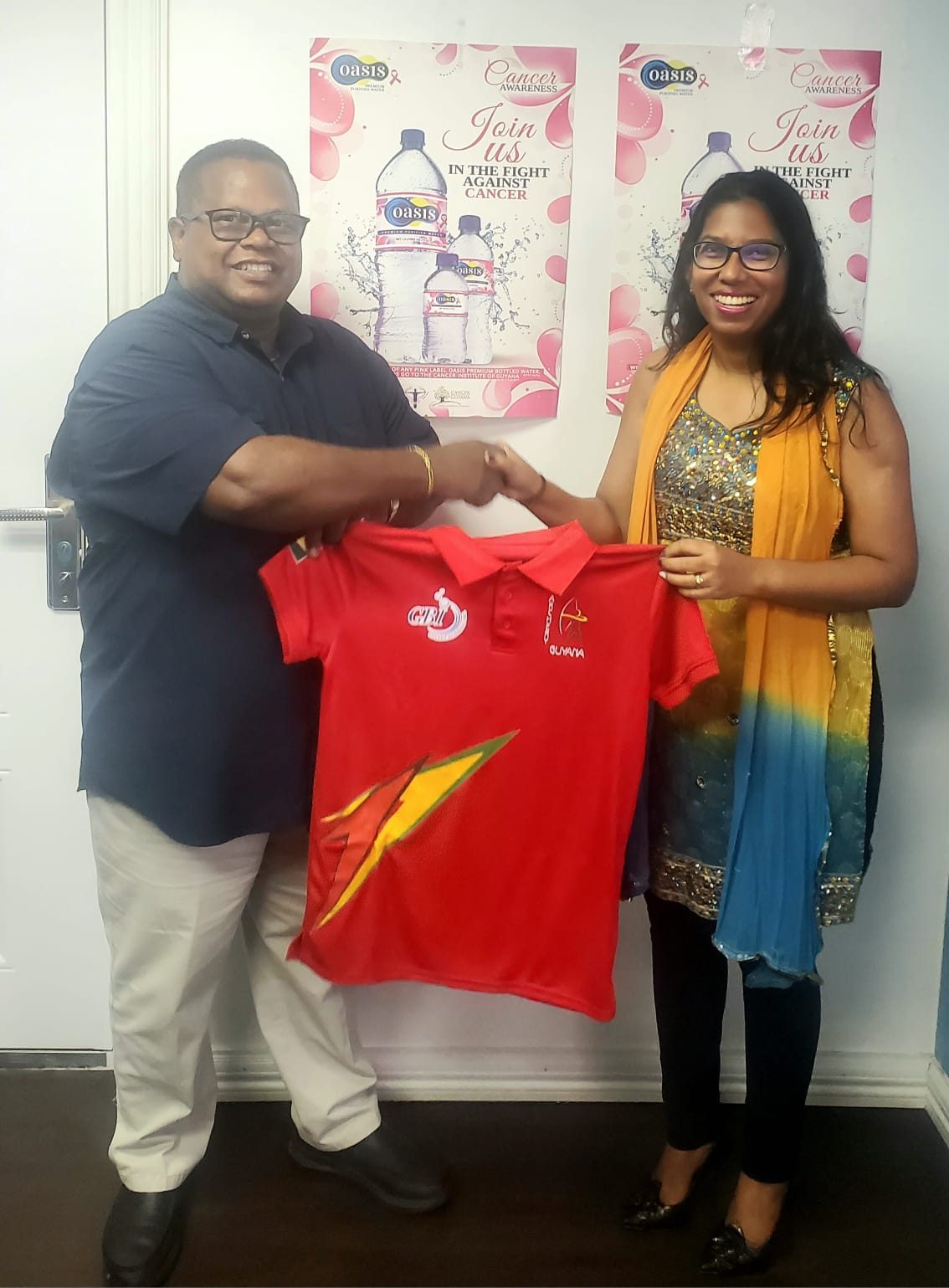 GBI Fulfils MoU commitment with Archery Guyana through team attire support