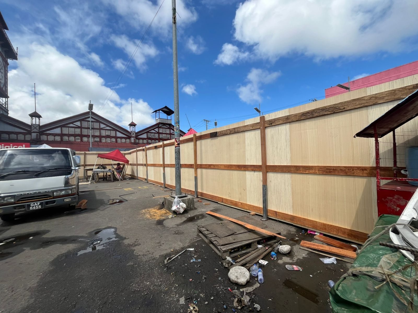‘PLYWOOD WALLS, NO NOTICE’: Stabroek Market vendors cry foul as Govt. blocks them for beautification project