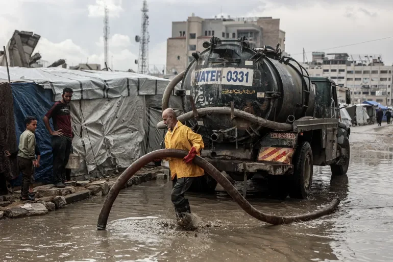 Palestinians reel under winter rains as Israel blocks Gaza shelter supplies