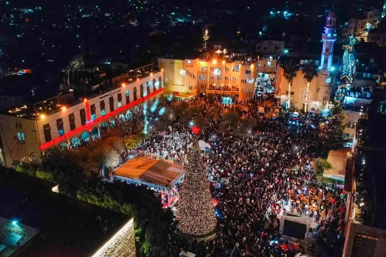 Bethlehem’s Christmas tree lights up after two years of darkness