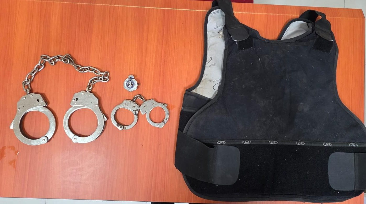 Bulletproof vest, police gear found in Tapakuma home