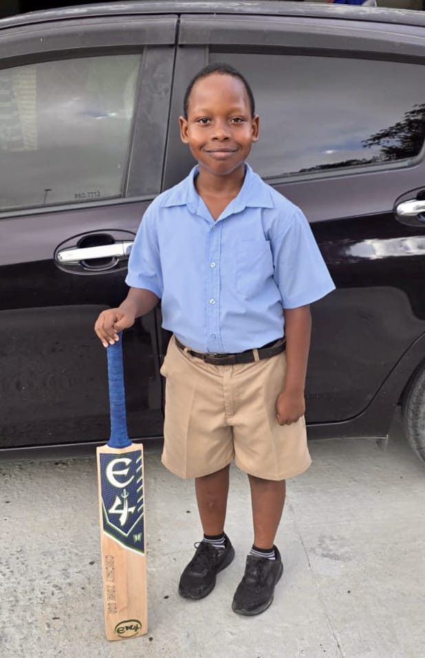 Eight-year-old Bryson Medford benefits from “Cricket gear for young and promising cricketers in Guyana”