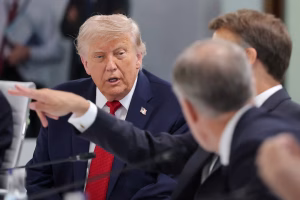 Trump says Iran deal averted 'economic catastrophe' but says he could still restart war